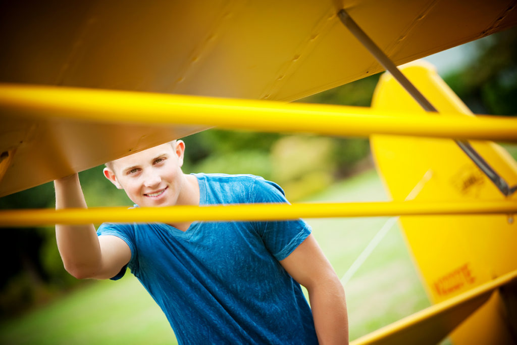 montrose photographer real life photographs captures this senior boy and his airplane