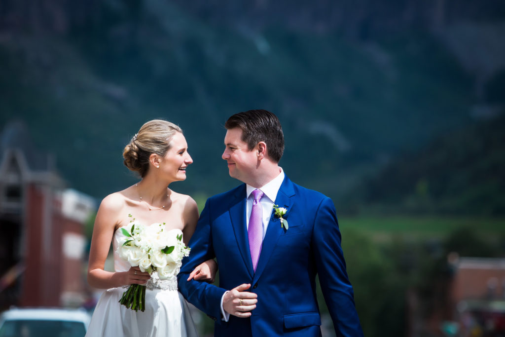 Bride and groom take portraits on their Telluride wedding day.  Photographed by Telluride wedding photographer Real Life Photographs