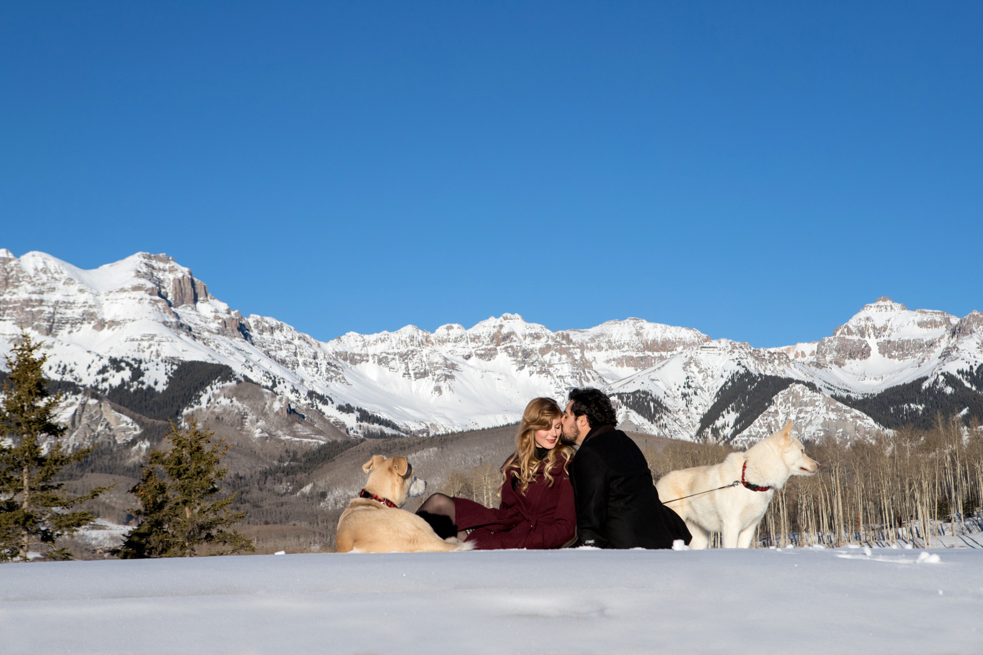 winter telluride engagement session with dogs, mount wilson
