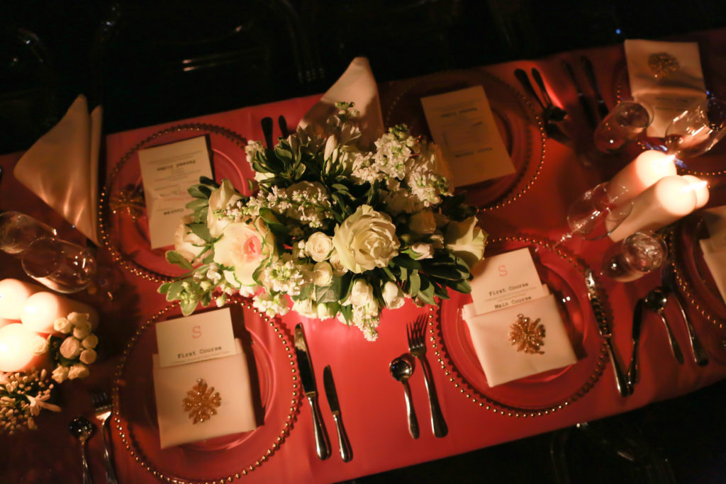 Gorrono Ranch is transformed by candle light and flowers. Table settings and flowers.