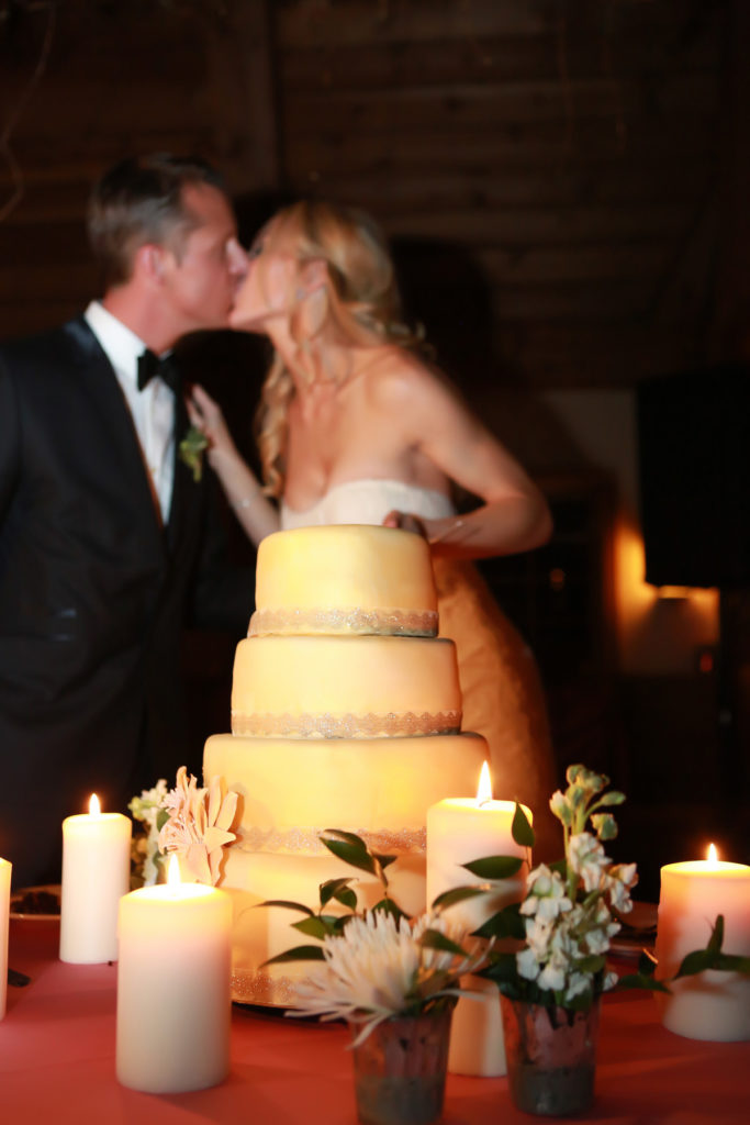bride and groom enjoy their wedding cake