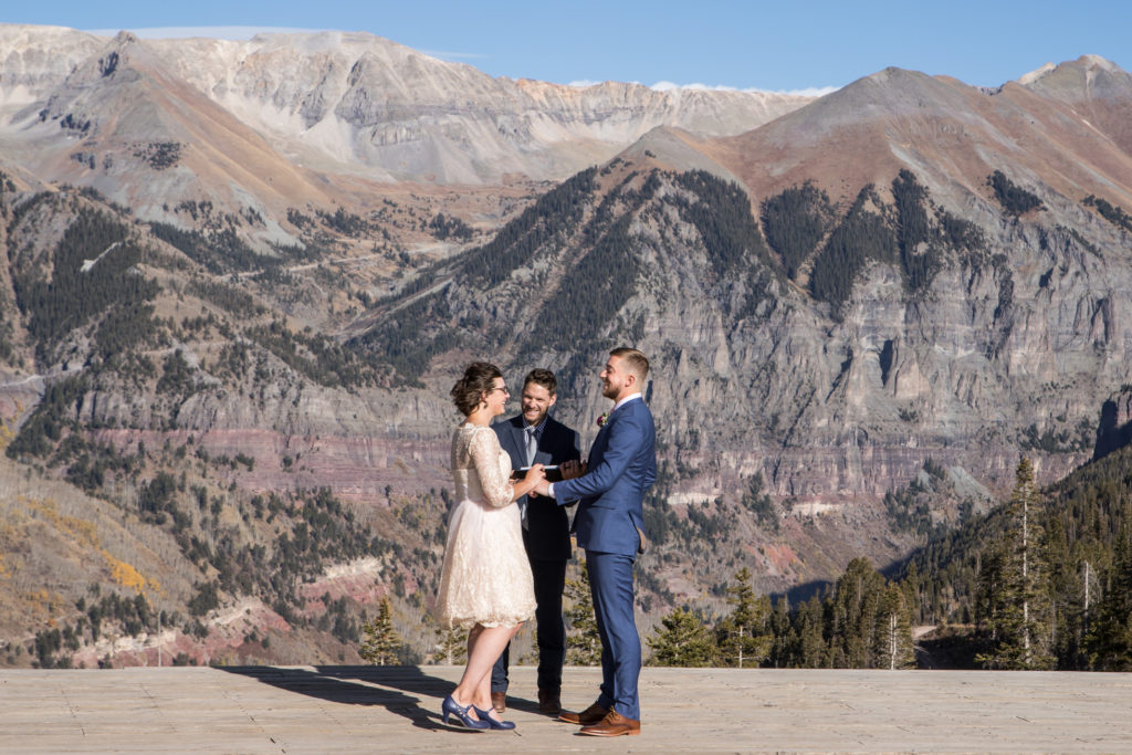 couple shares their vows on the deck at San Sophia Overlook