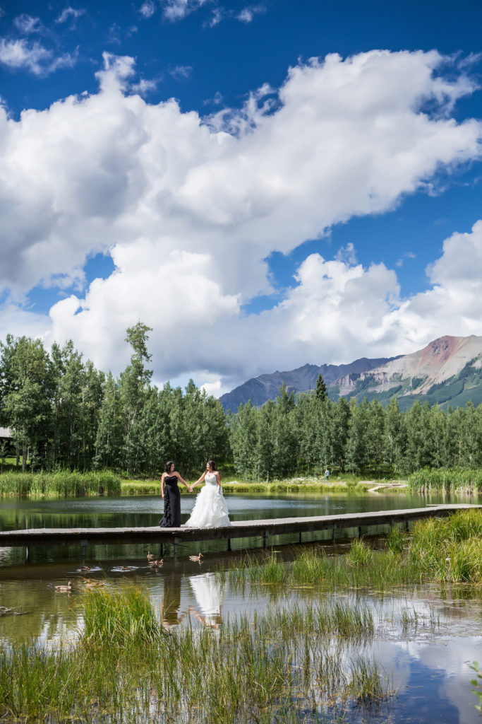 lesbian first look in Telluride, Colorado.  First look at Elk Pond in Mountain Village, Colorado.  Wedding at San Sophia Overlook with the reception at Tomboy Tavern.
