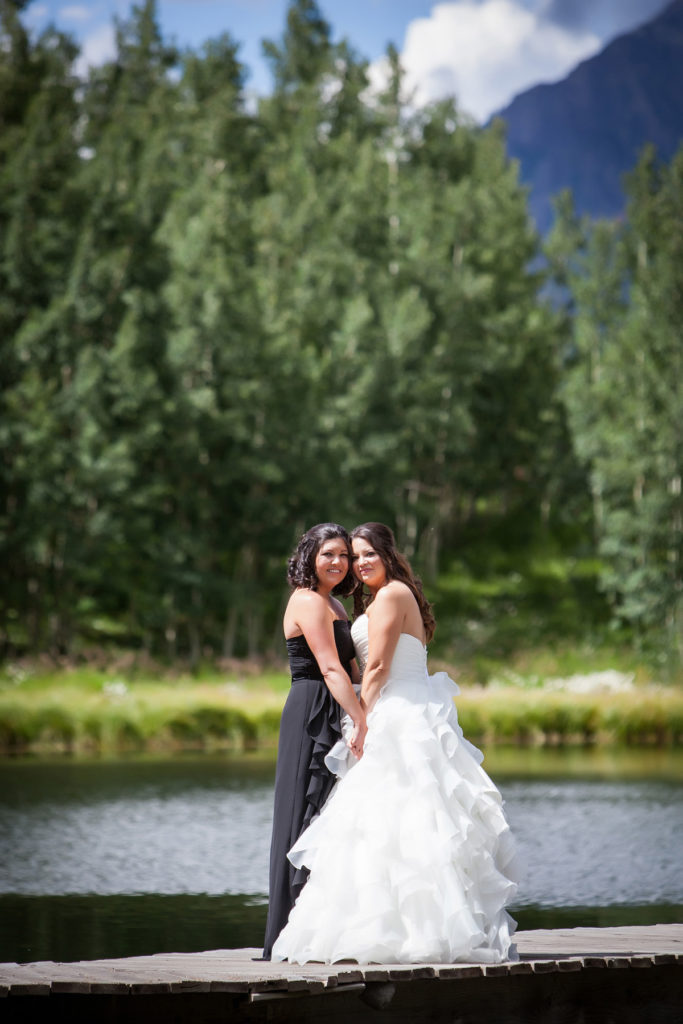 lesbian first look in Telluride, Colorado.  First look at Elk Pond in Mountain Village, Colorado.  Wedding at San Sophia Overlook with the reception at Tomboy Tavern.