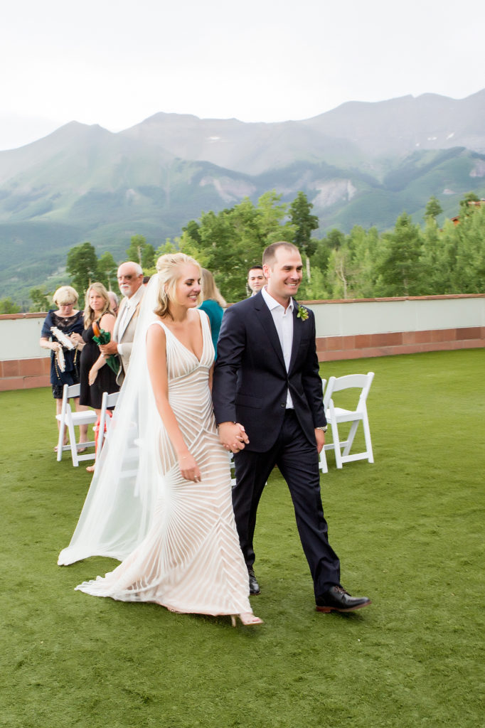 bride and groom recessional at the Peaks Wilson Terrace
