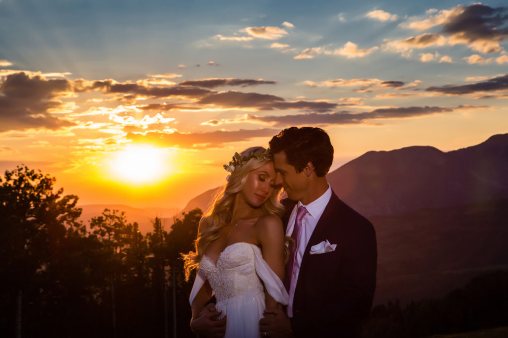 Telluride wedding photographer real life photographs takes a shot of a bride and groom at sunset in Telluride