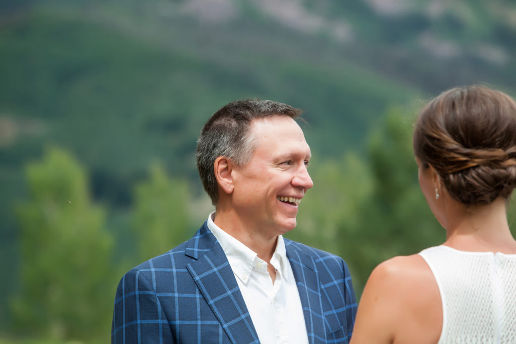 bride and groom laughing in the mountains of Telluride, Colorado
