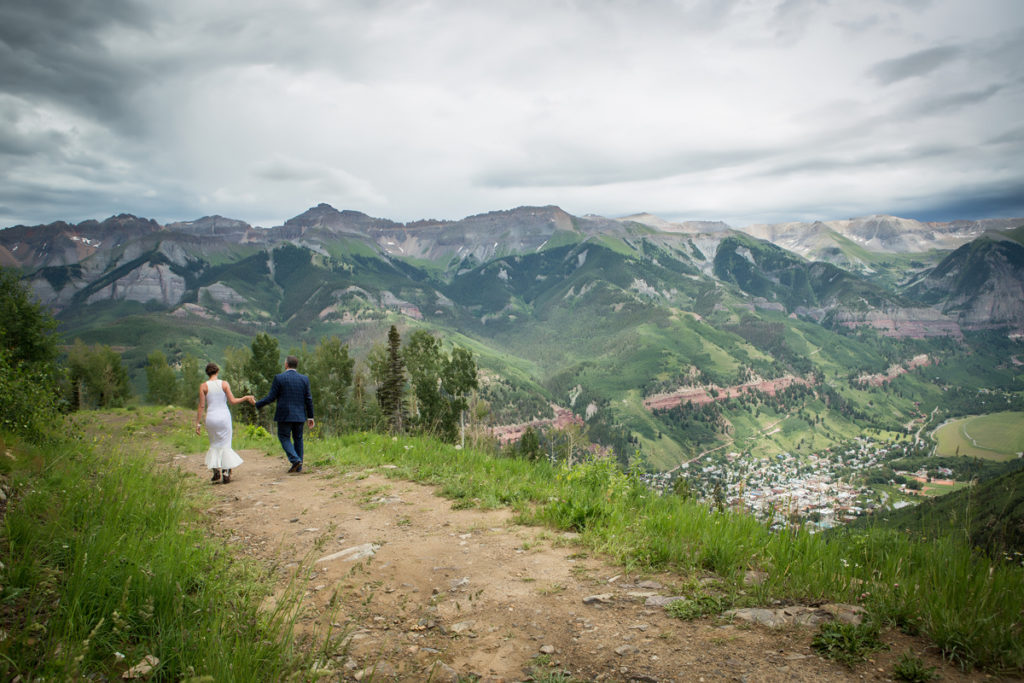 walking hand in hand high above the town of Telluride, Colorado