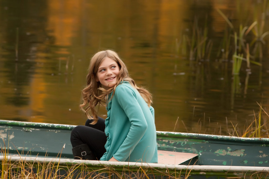 Telluride Family portrait session in a canoe during fall