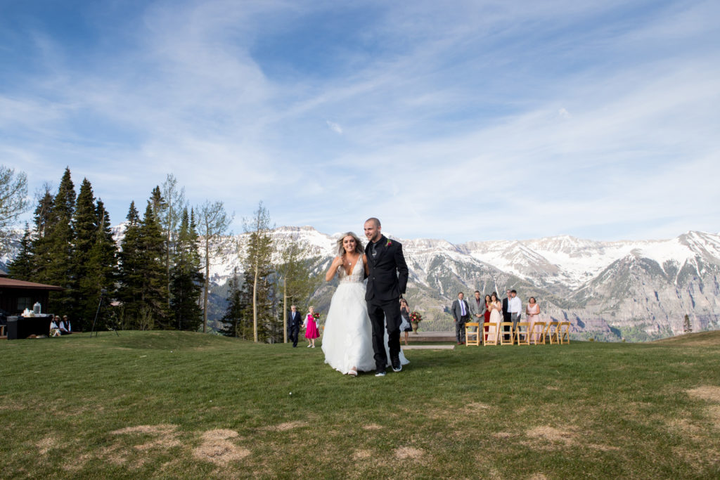 Elopement at San Sophia Overlook in Telluride, Colorado.the recessional with the mountains in the background.