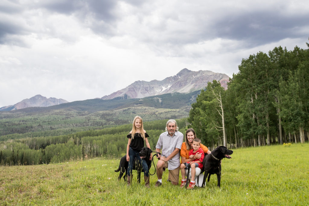 family with the dogs on wilson mesa in Telluride, CO