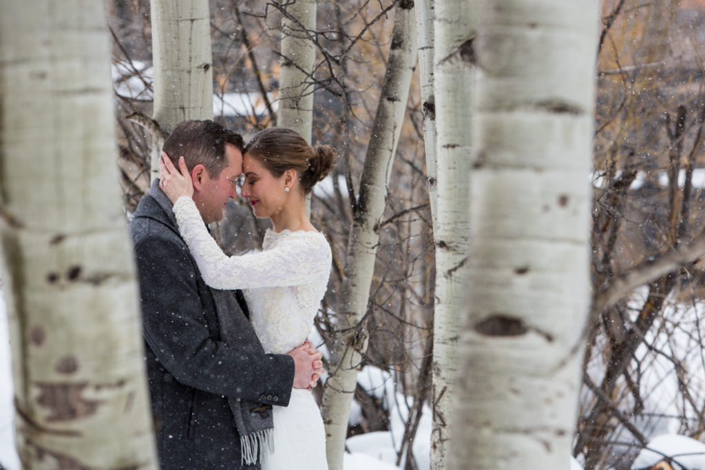 bride and groom in the aspen trees in Telluride Colorado