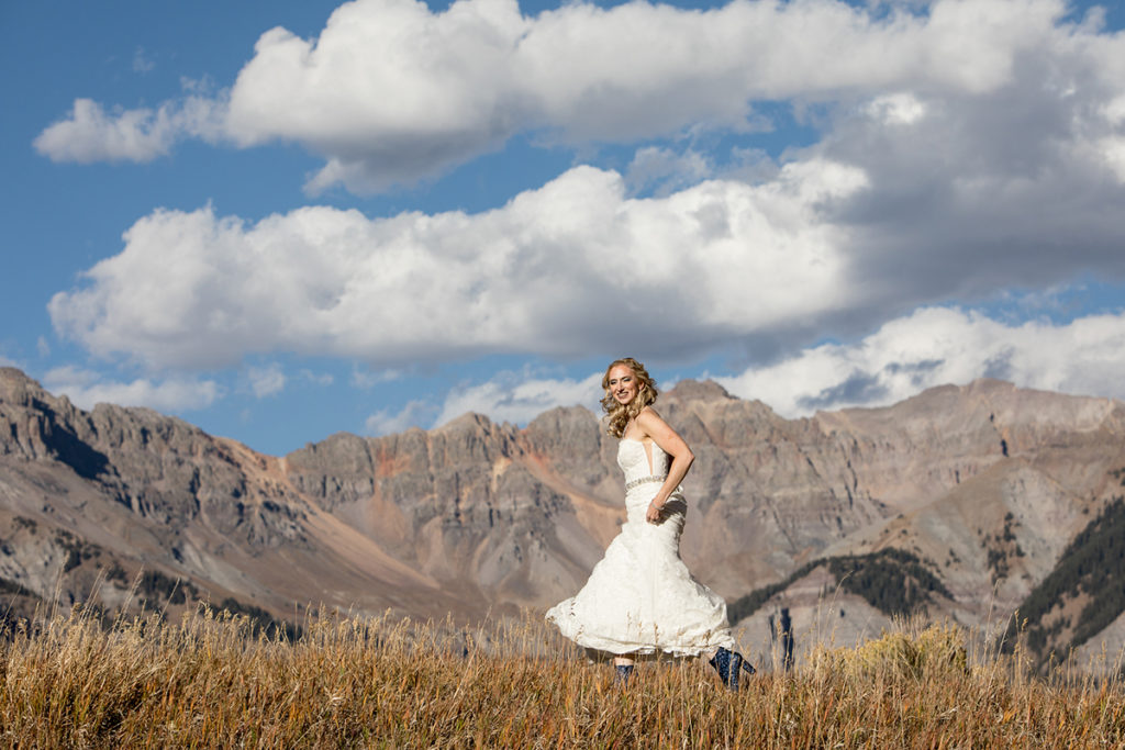 Bride running the mountains of Tellruide