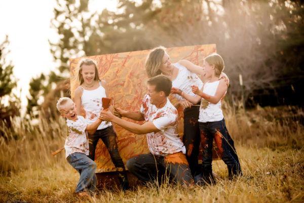 Telluride family photographer real life photographs family paint session