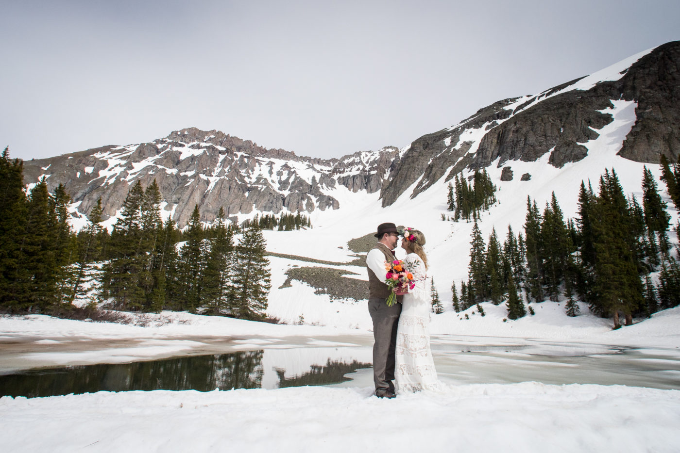 Observatory Alta Lakes elopement provides great mountain views with the frozen lake